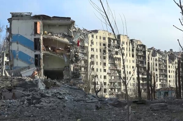 This photo taken from video released by the head of the Russian-controlled Donetsk region Denis Pushilin's telegram channel on Saturday, Feb. 24, 2024, shows damaged buildings, after Russian forces completed their takeover of Avdiivka, eastern Ukraine. Russian-controlled Donetsk region. (Head of the Russian-controlled Donetsk region Denis Pushilin telegram channel via AP)
