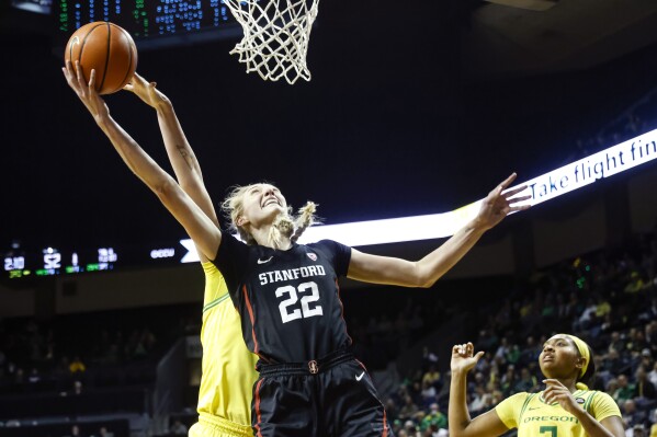 Stanford forward Cameron Brink (22) shoots against Oregon during the second half of an NCAA college basketball game in Eugene, Ore., Saturday, March 2, 2024. Stanford beat Oregon 76-56. (AP Photo/Thomas Boyd)