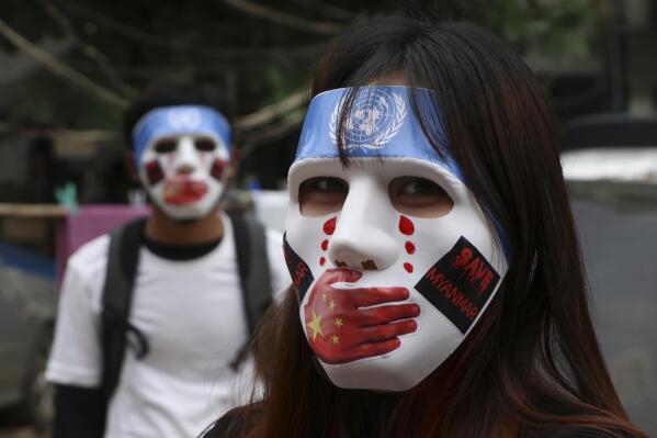 FILE - A young demonstrators participate in an anti-coup mask strike in Yangon, Myanmar, on April 4, 2021. Years after coming under scrutiny for contributing to ethnic and religious violence in Myanmar, internal documents viewed by The Associated Press show that Facebook continues to have problems detecting and moderating hate speech and misinformation on its platform in the Southeast Asian nation. (AP Photo, File)