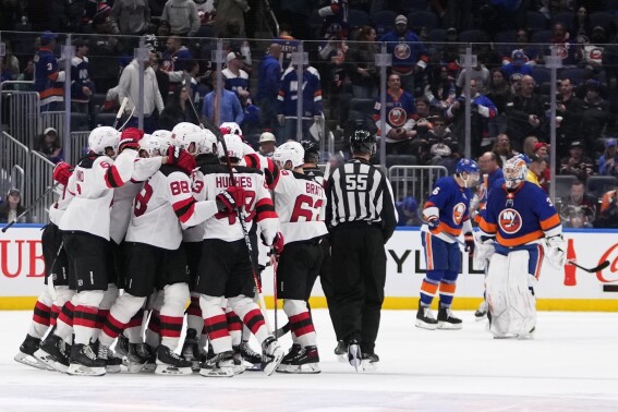 Senators let it slip away, Devils win in OT