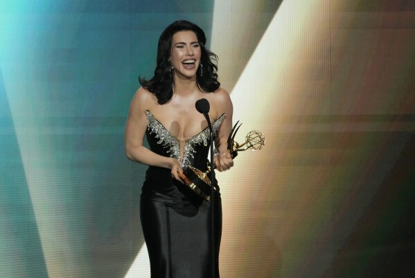 Jacqueline MacIness Wood accepts the award for outstanding performance by a lead actress in a daytime drama series for "The Bold and the Beautiful" during the 50th Daytime Emmy Awards on Friday, Dec. 15, 2023, at the Westin Bonaventure Hotel in Los Angeles. (AP Photo/Chris Pizzello)