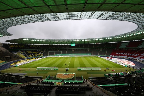 General view of the Olympiastadion Berlin stadium prior to the German soccer cup (DFB Pokal) final match between RB Leipzig and Borussia Dortmund in Berlin, Germany, Thursday, May 13, 2021. (Maja Hitij/Pool via AP, file)