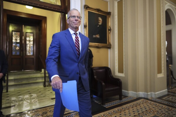 Senate Majority Leader John Thune, R-S.D., strides from the chamber after speaking about the reconciliation process to advance President Donald Trump's spending and tax bill, at the Capitol in Washington, Tuesday, June 3, 2025. (AP Photo/J. Scott Applewhite)