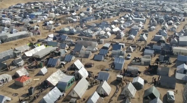 This drone image shows thousands of tents used by displaced people in Rafah, southern Gaza Strip on Friday, Dec. 29, 2023. The United Nations says tens of thousands of Palestinians streamed into the already crowded town at the southernmost end of Gaza in recent days. (AP Photo)