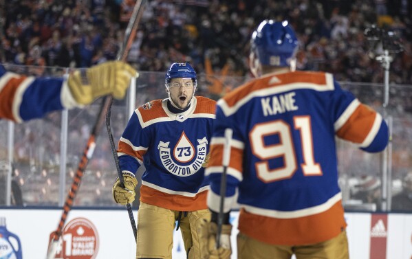 Oilers defeat Flames outdoors in NHL Heritage Classic