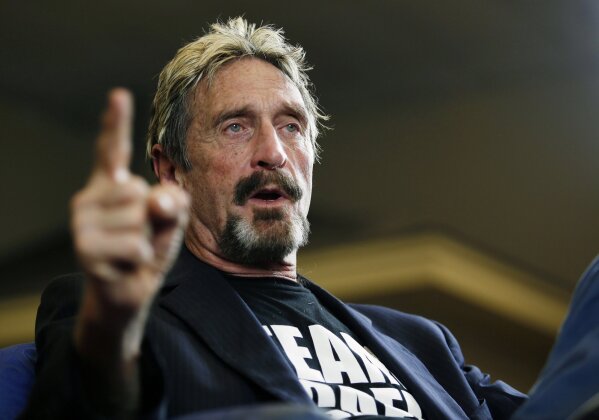 
              FILE - In this Sept. 9, 2015 file photo, internet security pioneer John McAfee announces his candidacy for president in Opelika, Ala. McAfee became involved with a defunct operation called the Round House started by Kyle Sandler in Opelika. He briefly ran for president with the business incubator as his headquarters and Sandler as an adviser in 2016. Sandler has since pleaded guilty to federal charges in an investment scam that involved the Round House. (Todd J. Van Emst/Opelika-Auburn News via AP, File)
            