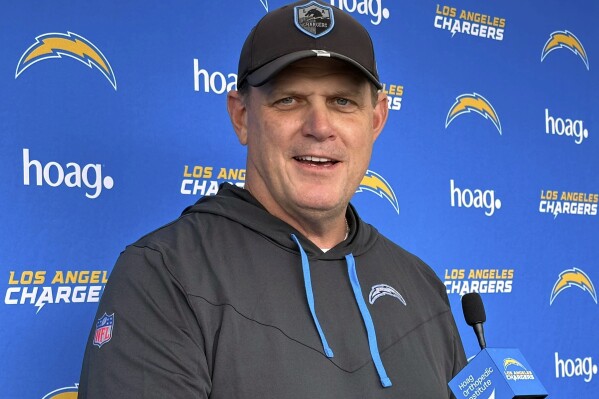 Los Angeles Chargers interim coach Giff Smith talks to the media after practice on Tuesday, Dec. 19, 2023, at the Chargers Hoag Performance Center in Costa Mesa, Calif.. Smith was named the interim coach last Friday after Brandon Staley was fired. (AP Photo/Joe Reedy)