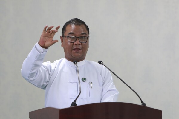 FILE - Gen. Zaw Min Tun, spokesman and deputy information minister, speaks during a media tour of the sitting Maravijaya Buddha statue, Friday, July 21, 2023 in Naypyitaw, Myanmar. An alliance of ethnic rebel groups has launched a coordinated offensive in northeastern Myanmar to seize military targets in areas near the Chinese border. Maj. Gen. Zaw Min Tun acknowledged in a phone interview, Friday, Oct. 27, with pro-military media outlet NP News that towns in northern Shan state had been attacked, and members of the security forces were killed in the town of Chinshwehaw, but did not give a number. (AP Photo/Aung Shine Oo)