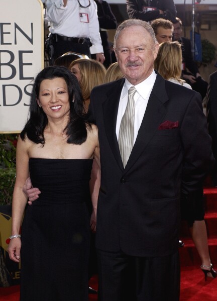 Actor Gene Hackman arrives with his wife, Betsy Arakawa, for the 60th Annual Golden Globe Awards in Beverly Hills, Calif., Sunday, Jan. 19, 2003. (AP Photo/Mark J. Terrill, File)