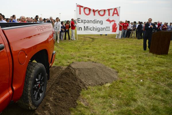 FILE - Toyota officials celebrate the groundbreaking for the Toyota Technical Center in York Township, Mich., on June 11, 2015. Toyota says it will spend nearly $50 million to build a vehicle battery testing laboratory at its North American research center in Michigan. The company said Thursday, June 8, 2023 that the lab in York Township south of Ann Arbor will test batteries made for hybrid and electric vehicles at a new factory in North Carolina, as well as from battery suppliers. (Alex McDougall/Ann Arbor News via AP, file)