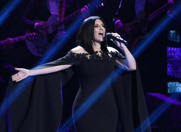 FILE - Laura Pausini performs "Lado Derecho del Corazon" at the 17th annual Latin Grammy Awards in Las Vegas on Nov. 17, 2016. Pausini will perform the Oscar nominated song "Io Si," (Seen) which she co-wrote with Diane Warren for the film "The Life Ahead." The Oscars will be broadcast on Sunday. (Photo by Chris Pizzello/Invision/AP, File)