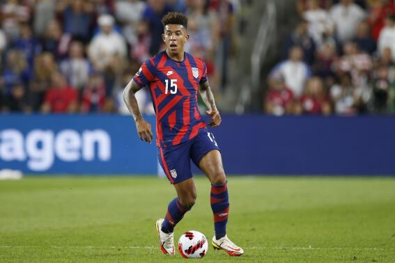 FILE - United States' Chris Richards plays against Costa Rica during a CONCACAF FIFA World Cup qualifying soccer match Oct. 13, 2021, in Columbus, Ohio. Richards will miss the World Cup because of an injury that has sidelined him for more than two months. (AP Photo/Jay LaPrete, File)