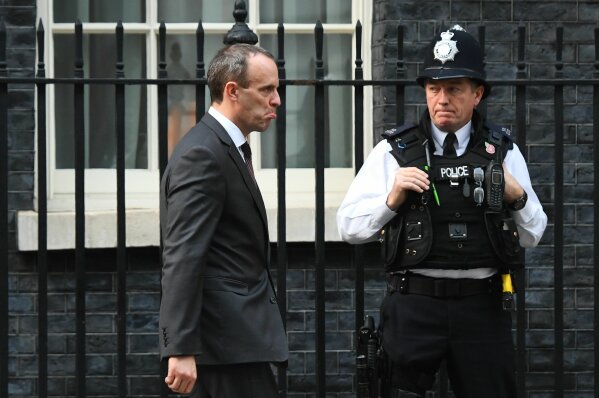 
              Britain's Secretary of State for Exiting the European Union Dominic Raab, leaves after a cabinet meeting at 10 Downing Street in London, Tuesday, Nov. 13, 2018. Negotiators from Britain and the European Union have struck a proposed divorce deal that will be presented to politicians on both sides for approval, officials in London and Brussels said Tuesday. (Victoria Jones/PA via AP)
            