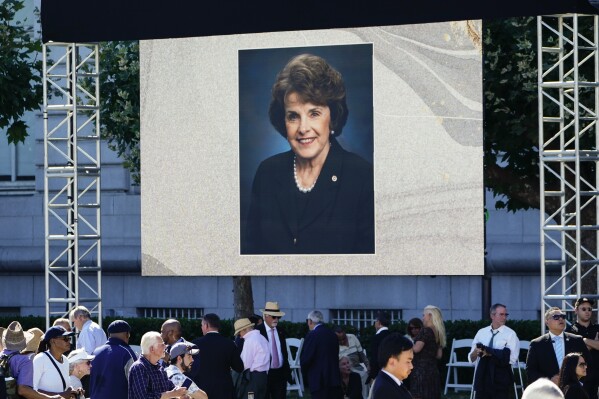 A photograph of U.S. Sen. Dianne Feinstein is flashed on a screen during a memorial service in her honor, Thursday, Oct. 5, 2023, in San Francisco. (AP Photo/Godofredo A. Vásquez)