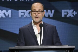 FILE - In this Aug. 3, 2018, file photo, John Landgraf, CEO, FX Networks and FX Productions, participates in the executive panel during the FX Television Critics Association Summer Press Tour in Beverly Hills, Calif.  (Photo by Willy Sanjuan/Invision/AP, File)