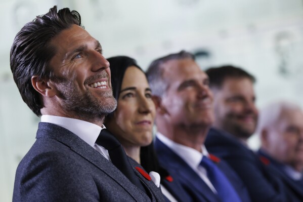 Hockey Hall of Fame 2023 inductee Henrik Lundqvist smiles during ceremonies in Toronto, Friday, Nov. 10, 2023. (Cole Burston/The Canadian Press via AP)