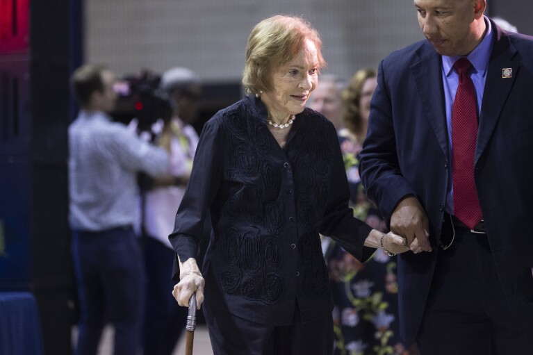FILE - Former first lady Rosalynn Carter arrives for a Carter Town Hall in which her husband Jimmy Carter was taking questions from students, Sept. 18, 2019, at Emory University in Atlanta. Rosalynn Carter, the closest adviser to Jimmy Carter during his one term as U.S. president and their four decades thereafter as global humanitarians, died Sunday, Nov. 19, 2023. She was 96. (AP Photo/John Amis, File)