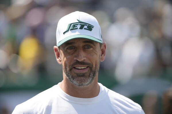 New York Jets quarterback Aaron Rodgers is seen before the start of an NFL preseason football game between the Washington Commanders and New York Jets Saturday, Aug. 10, 2024, in East Rutherford. N.J. (AP Photo/Pamela Smith)