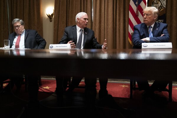 FILE - In this June 15, 2020, file photo Attorney General William Barr, left, and President Donald Trump listen as Vice President Mike Pence speaks during a roundtable about America's seniors, in the Cabinet Room of the White House in Washington. Barr is scheduled to appear for the first time before the House Judiciary Committee on Tuesday, July 28. (AP Photo/Evan Vucci, File)
