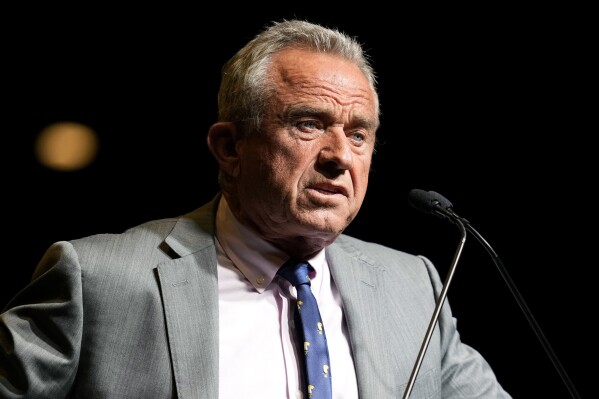 FILE - Independent presidential candidate Robert F. Kennedy Jr. speaks to supporters during a campaign event, April 13, 2024, in West Des Moines, Iowa. Former President Donald Trump is known for leveling constant and often personal attacks on top rivals such as Joe Biden. Lately, he's increasingly turned that same caustic approach toward Kennedy Jr. (AP Photo/Charlie Neibergall, File)