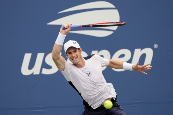 Andy Murray, of Britain, returns a shot to Corentin, Moutet, of France, during the first round of the U.S. Open tennis championships, Aug. 29, 2023, in New York. (AP Photo/Mary Altaffer)