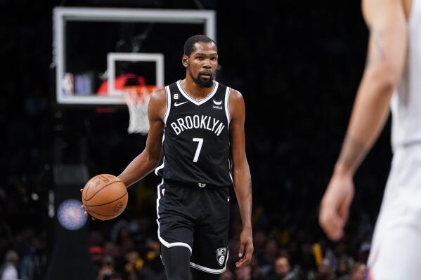 Brooklyn Nets' Kevin Durant (7) dribbles during the second half of an NBA basketball game against the New York Knicks Wednesday, Nov. 9, 2022, in New York. The Nets won 112-85. (AP Photo/Frank Franklin II)