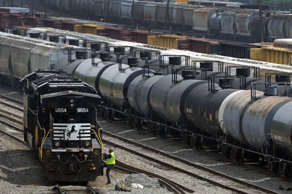 FILE - Norfolk Southern locomotives are moved in Norfolk Southern's Conway Terminal, June 17, 2023, in Conway, Pa. Norfolk Southern has installed the first of what will be more than a dozen automated inspection portals on its tracks in Ohio — not far from where one of its trains derailed in February and spilled hazardous chemicals that caught fire. (AP Photo/Gene J. Puskar, File)