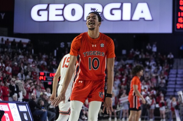 Auburn guard Chad Baker-Mazara reacts after a basket during the first half of an NCAA college basketball game against Georgia Saturday, Feb. 24, 2024, in Athens, Ga. (AP Photo/John Bazemore)