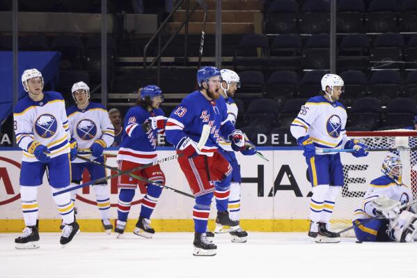 New York Rangers' Alexis Lafreniere (13) celebrates his goal against the Buffalo Sabres during the third period of an NHL hockey game Tuesday, April 27, 2021, in New York. (Bruce Bennett/Pool Photo via AP)