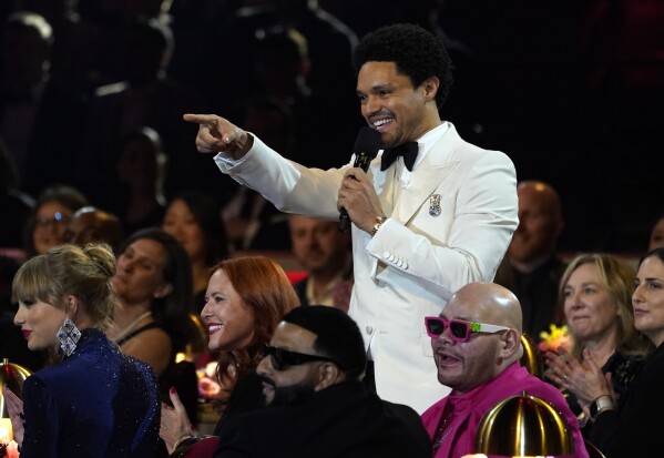 FILE - Host Trevor Noah speaks at the 65th annual Grammy Awards on Sunday, Feb. 5, 2023, in Los Angeles. Noah will host the 2024 Grammy Awards on Sunday. (AP Photo/Chris Pizzello, File)