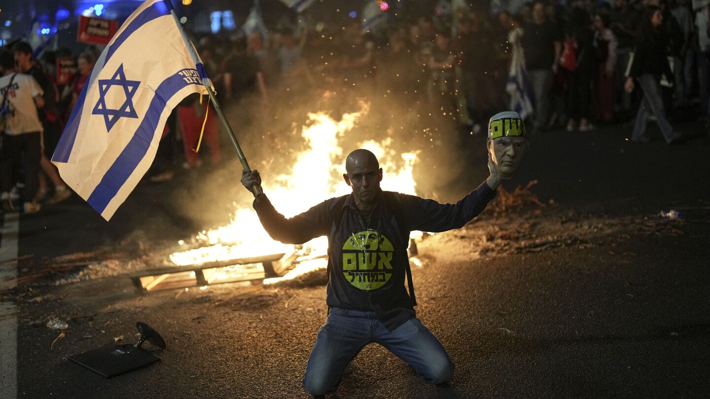 Israel’s Netanyahu dismisses his protection minister as wars rage. Protests erupt throughout nation