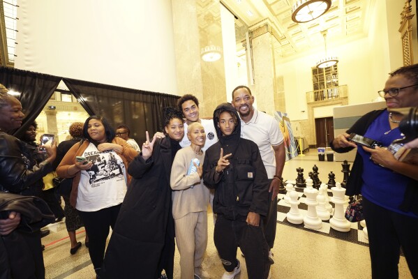 This photo provided by Enoch Pratt Free Library shows from left, Willow Smith, Trey Smith, Jada Pinkett Smith, Jaden Smith and Will Smith at the Enoch Pratt Free Library in Baltimore on Wednesday, Oct. 18, 2023. Will Smith joined Jada Pinkett Smith on stage as she promoted her new memoir in her hometown Wednesday night, pledging lifelong support for her just a week after she revealed that the couple had been separated since 2016. (John Cassini /Enoch Pratt Free Library via AP)