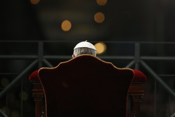 Pope Francis presides the Via Crucis (Way of the Cross) torchlight procession celebrated in front of the Colosseum on Good Friday in Rome, March 29, 2013. (AP Photo/Andrew Medichini)
