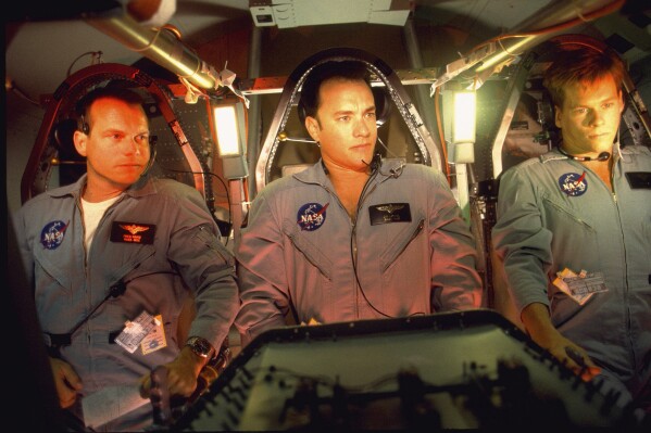 This image released by the National Film Registry shows, from left, Bill Paxton, Tom Hanks and Kevin Bacon in a scene from the 1995 film "Apollo 13." The film has been selected for preservation in the National Film Registry. (NBC Universal/National Film Registry via AP)