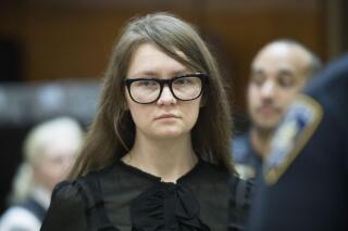 FILE - Anna Sorokin returns to the courtroom Thursday, April 25, 2019, in New York. Convicted swindler Anna Sorokin spoke to The New York Times about how important it is to her to remain in New York despite risks of deportation. Sorokin, 31, was released Saturday, Oct. 8, 2022, from U.S immigration custody to house arrest. She told the Times she would feel like she was “running from something” if she were to let herself be deported to Germany. (AP Photo/Mary Altaffer, File)