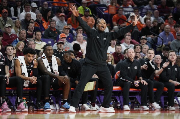 South Carolina head coach Lamont Paris reacts during the first half of an NCAA college basketball game against Clemson, Wednesday, Dec. 6, 2023, in Clemson, S.C.. (AP Photo/=03387179=)