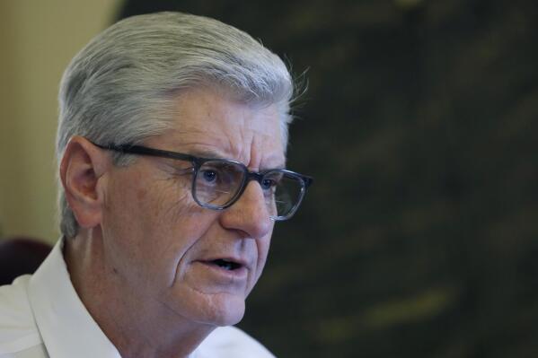 FILE - Gov. Phil Bryant speaks about his legacy following a life of public service, Jan. 8, 2020, in his office at the Capitol in Jackson, Miss. Newly revealed text messages show how deeply involved the former Mississippi governor was in directing more than $1 million in welfare money to retired NFL quarterback Brett Favre. The texts were in court documents filed Monday, Sept. 12, 2022, in state court by an attorney for the nonprofit known as the Mississippi Community Education Center. (AP Photo/Rogelio V. Solis, File)