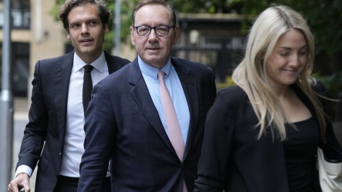 Actor Kevin Spacey, centre, arrives at Southwark Crown Court for the start of his trial in London, Wednesday, June 28, 2023. Spacey is going on trial on charges he sexually assaulted four men as long as two decades ago. The double-Oscar winner faces a dozen charges as his trial begins Wednesday at Southwark Crown Court. (AP Photo/Frank Augstein)