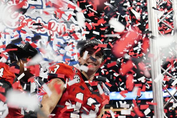 Georgia quarterback Stetson Bennett celebrates after the Peach Bowl NCAA college football semifinal playoff game between Georgia and Ohio State, Sunday, Jan. 1, 2023, in Atlanta. Georgia won 42-41. (AP Photo/Brynn Anderson)