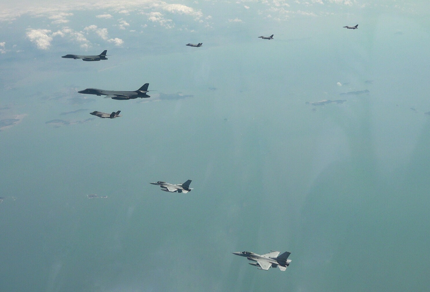 US flies long-range bomber for drill with South Korea, as the North marks a key state anniversary