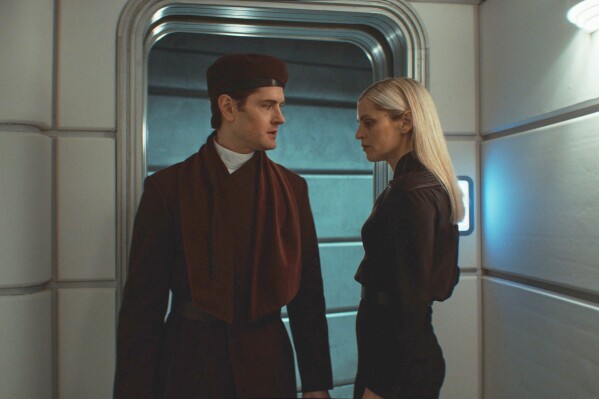 This image released by Disney shows Kyle Soller, left, and Denise Gough in a scene from the second season of Lucasfilm's "Andor." (Lucasfilm Ltd./Disney via AP)