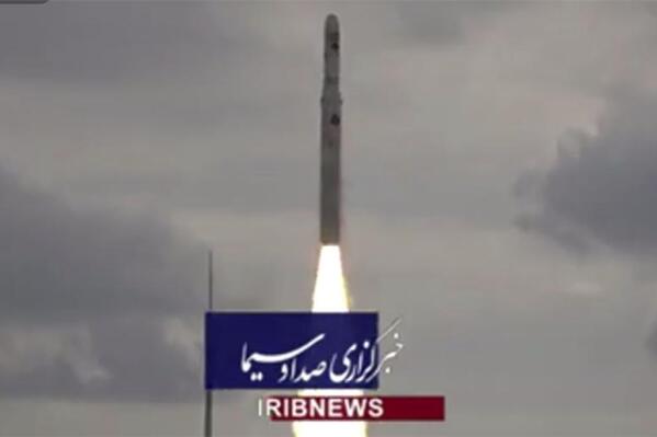 This image taken from video footage aired by Iranian state television on Saturday, Nov. 5, 2022, shows the launch of a satellite carrier rocket by Iran’s Revolutionary Guard from an undisclosed desert location. Iran’s powerful paramilitary Guard launched the rocket as nationwide protests continue to engulf the country. (Iranian state television via AP)