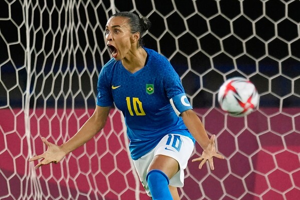 Brazil's Marta celebrates after scoring a goal during a women's soccer match against Netherlands at the 2020 Summer Olympics, Saturday, July 24, 2021, in Miyagi, Japan. (AP Photo/Andre Penner, File)