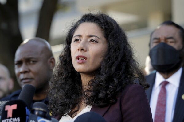 FILE - Harris County Judge Lena Hidalgo, Houston Police Chief Troy Finner, left, and U.S. Rep. Al Green, right, speak during a news conference in Houston, Nov. 6, 2021.  Hidalgo, a Democrat who made a national profile as mayor of Texas' largest county, announced on Monday, August 7, 2023, that he would be taking a temporary leave of absence for treatment of clinical depression.  (AP Photo/Michael Wike, File)