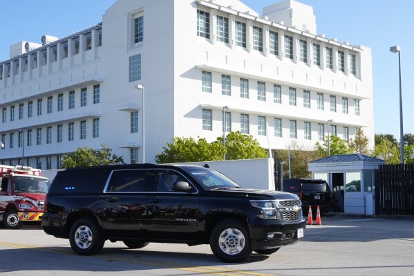 Former President Donald Trump arrives at the Federal Courthouse, Monday, Feb. 12, 2024, in Fort Pierce, Fla. Trump is appearing at a closed hearing in his criminal case charging him with mishandling classified documents. (AP Photo/Marta Lavandier)