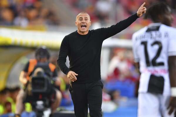 Lecce coach Fabio Cannavaro gives instructions during the Serie A soccer match between Lecce and Udinese Calcio at the Via del Mare Stadium in Lecce, Italy, Monday, May 13, 2024. (Giovanni Evangelista/LaPresse via AP)