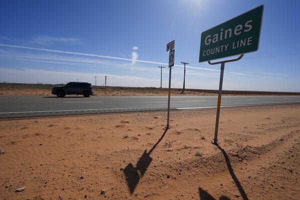 The Gaines County line is seen along Route 180 Wednesday, Feb. 26, 2025, in Lamesa, Texas. (AP Photo/Julio Cortez, File)