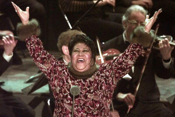 FILE - This Feb. 25, 1998 file photo shows Aretha Franklin after performing "Nessun Dorma" from Puccini's "Turandot" as a last-minute replacement for an ailing Luciano Pavarotti at the 40th Annual ...