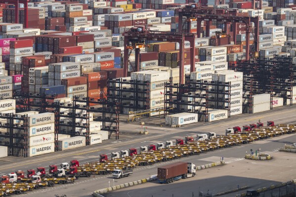 Containers pile up at Kwai Chung Container terminal in Hong Kong, Tuesday, Apr. 8, 2025. (AP Photo/Chan Long Hei)
