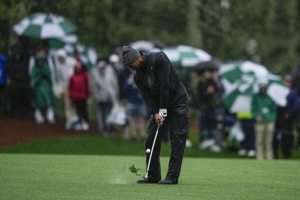 Tiger Woods hits from the fairway on the 15th hole during the weather delayed third round of the Masters golf tournament at Augusta National Golf Club on Saturday, April 8, 2023, in Augusta, Ga. (AP Photo/Matt Slocum)